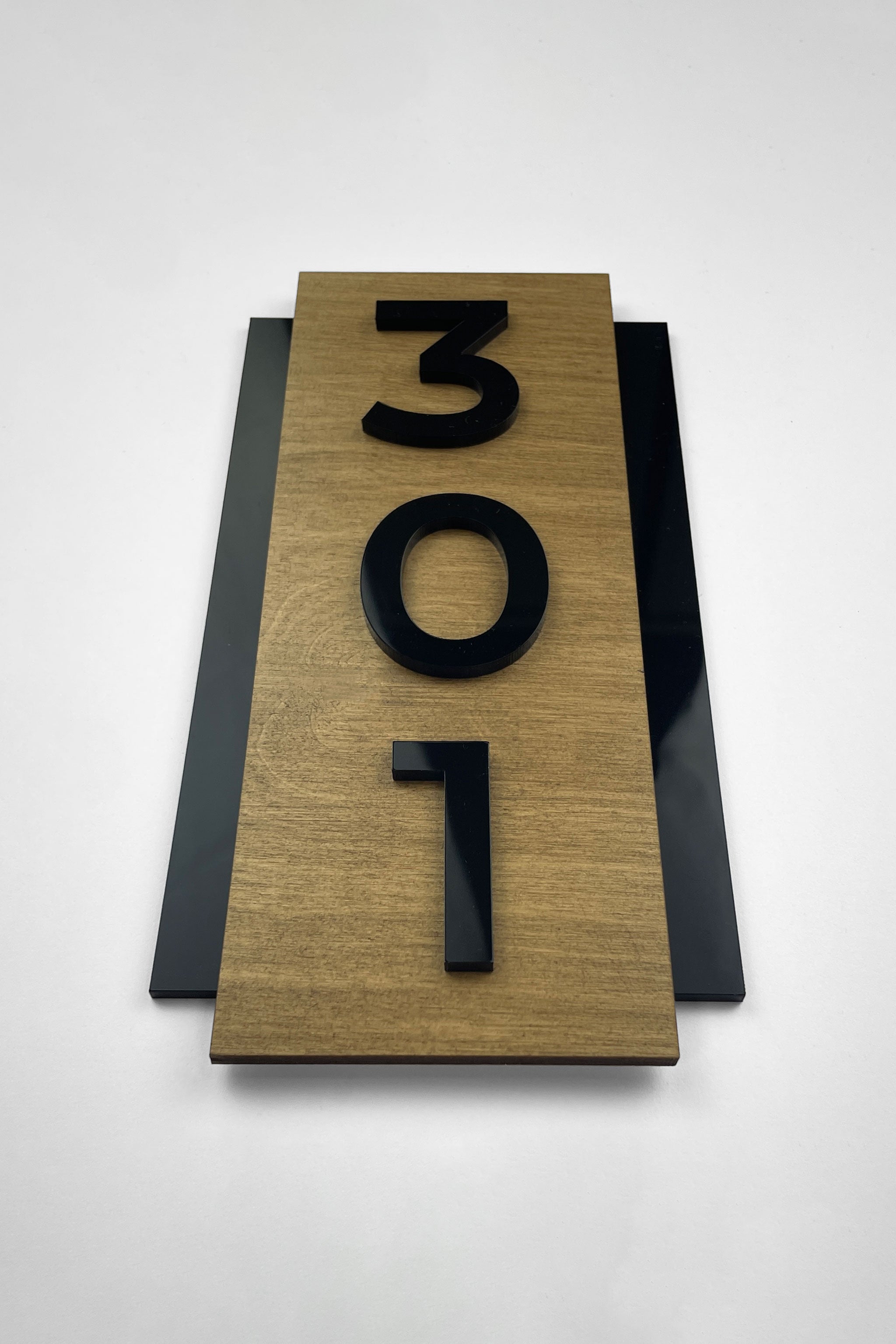 ALUMADESIGNCO vertical hotel room number sign made from natural birch wood and black acrylic numbers, modern Scandinavian door number plaque designed for hotel corridors, apartments, and Airbnb interiors