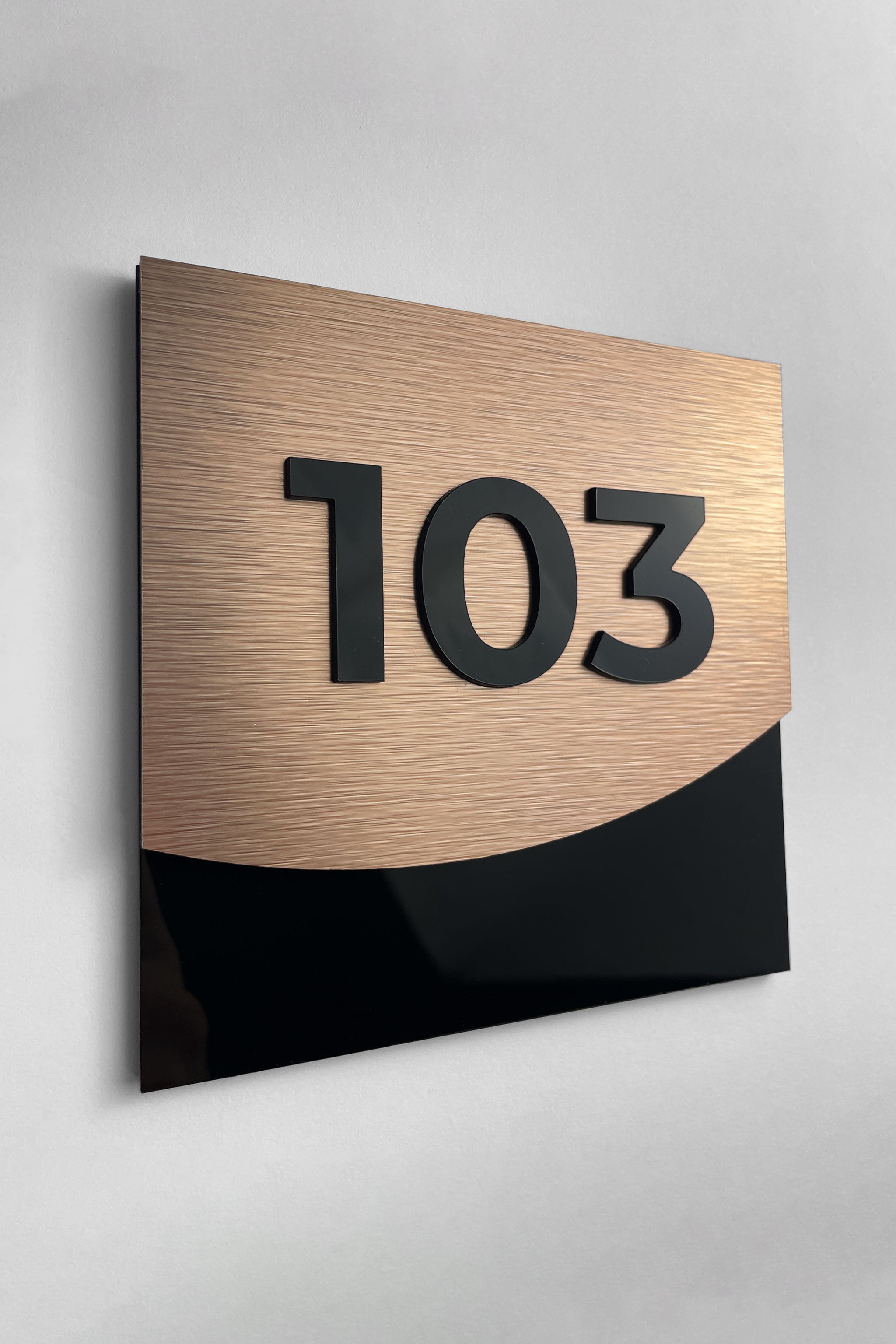 3D layered bronze and black acrylic apartment door number sign by ALUMADESIGNCO, premium door plaque for residential buildings and contemporary interiors