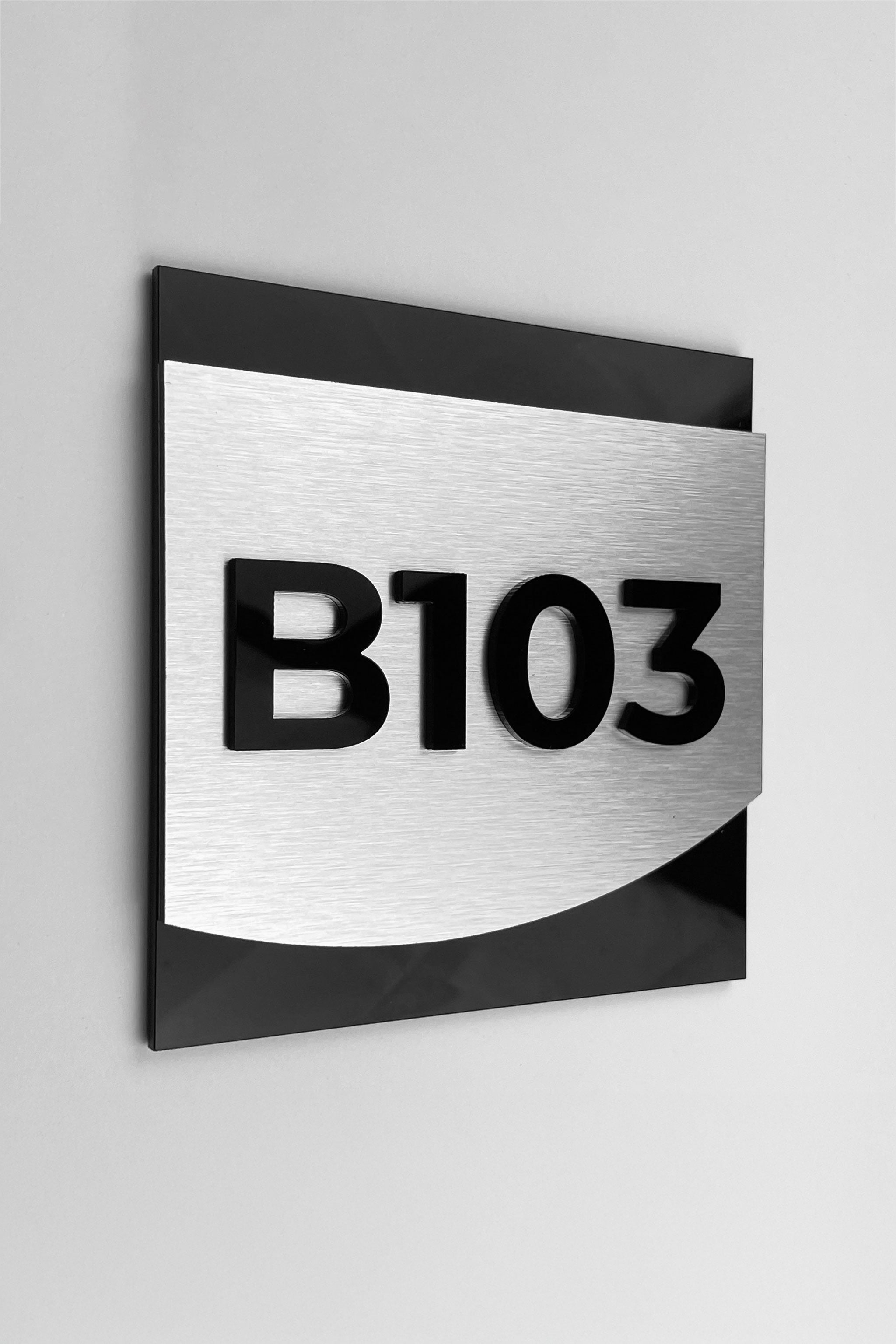 Brushed silver suite room number sign with 3D acrylic numbers by ALUMADESIGNCO, premium door plaque for hotel suites and apartment interiors