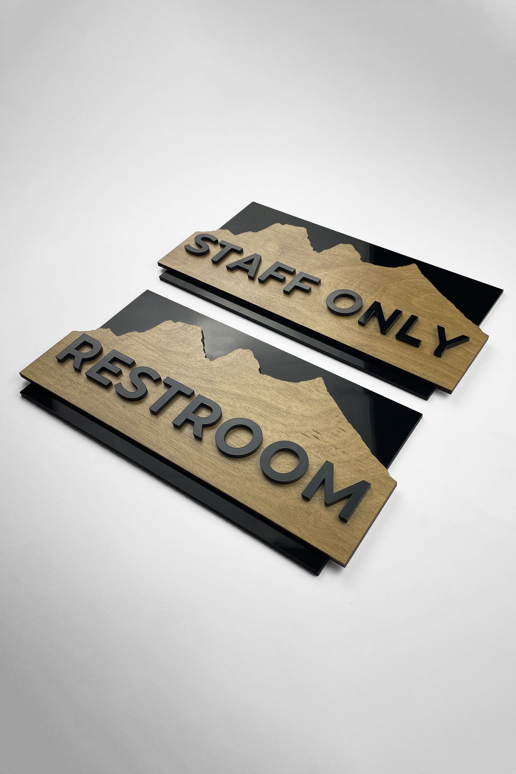 Modern high-end interior door sign by ALUMADESIGNCO combining natural birch wood and black acrylic lettering, stylish custom plaque for interiors