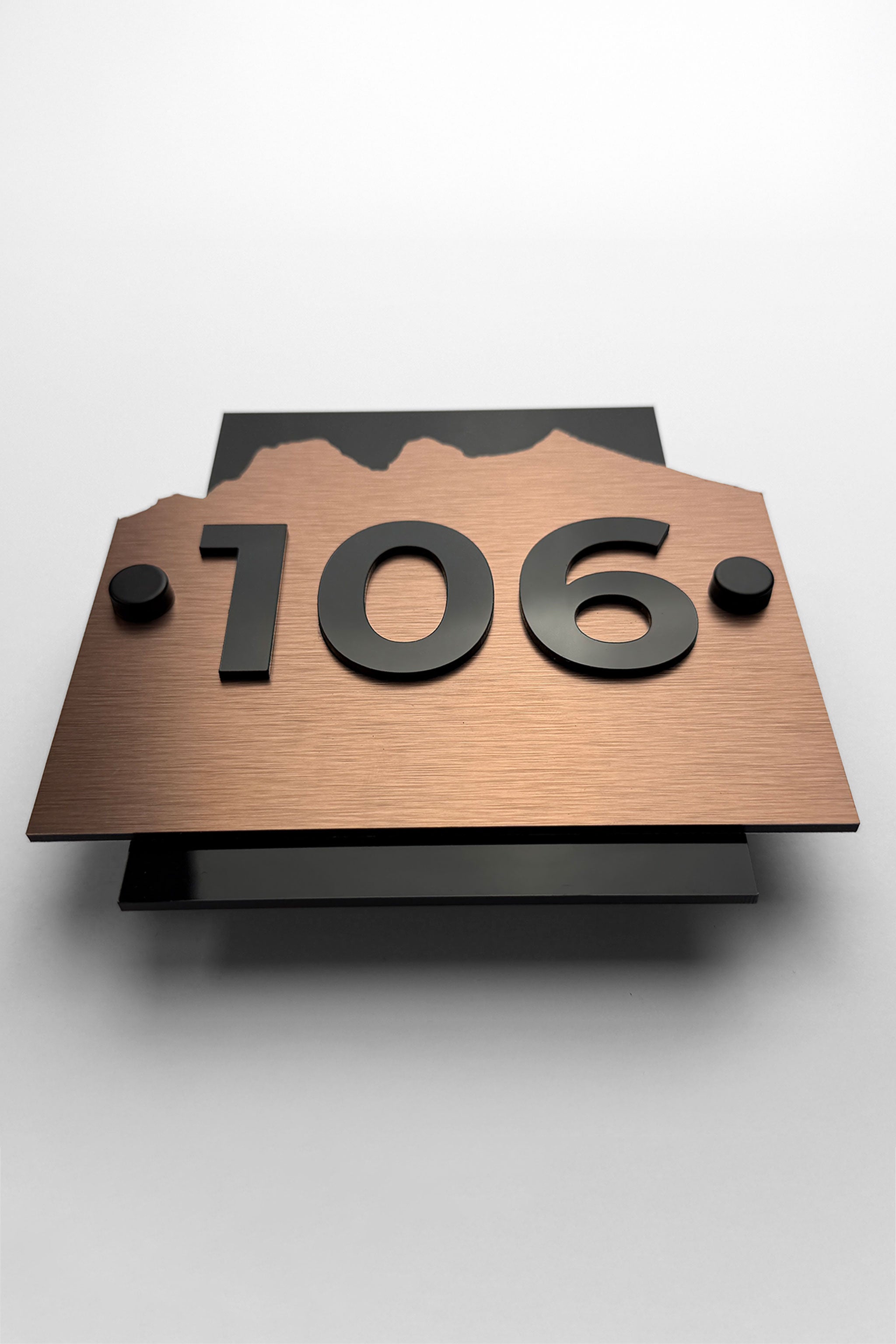ALUMADESIGNCO Alpine brushed bronze wall number plaque with black acrylic numbers and standoff mounting, premium hotel room and apartment door signage