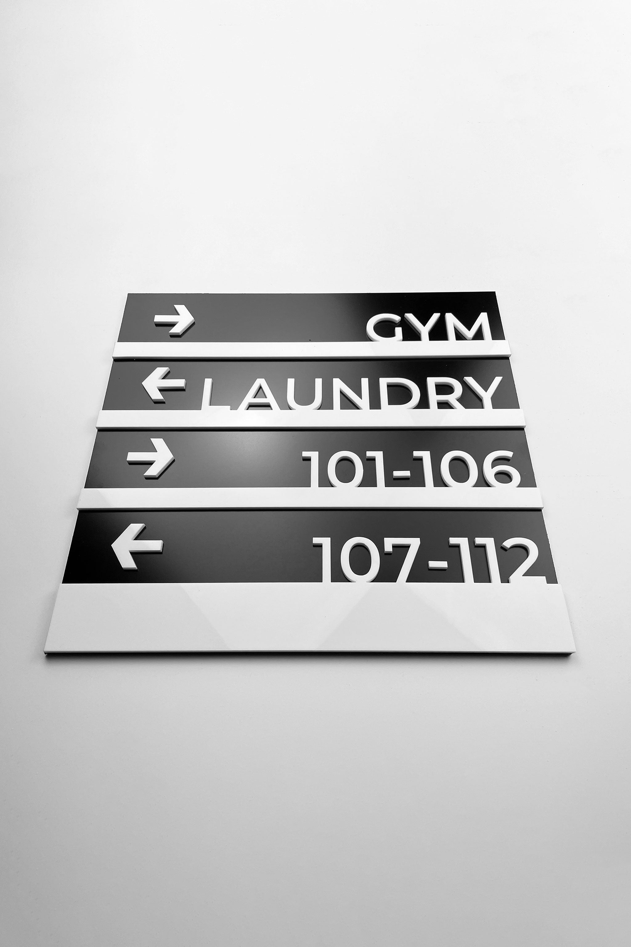 ALUMADESIGNCO premium wall plaque wayfinding sign with minimalist modern style, directional signage for offices, hotels, apartments, and commercial interiors