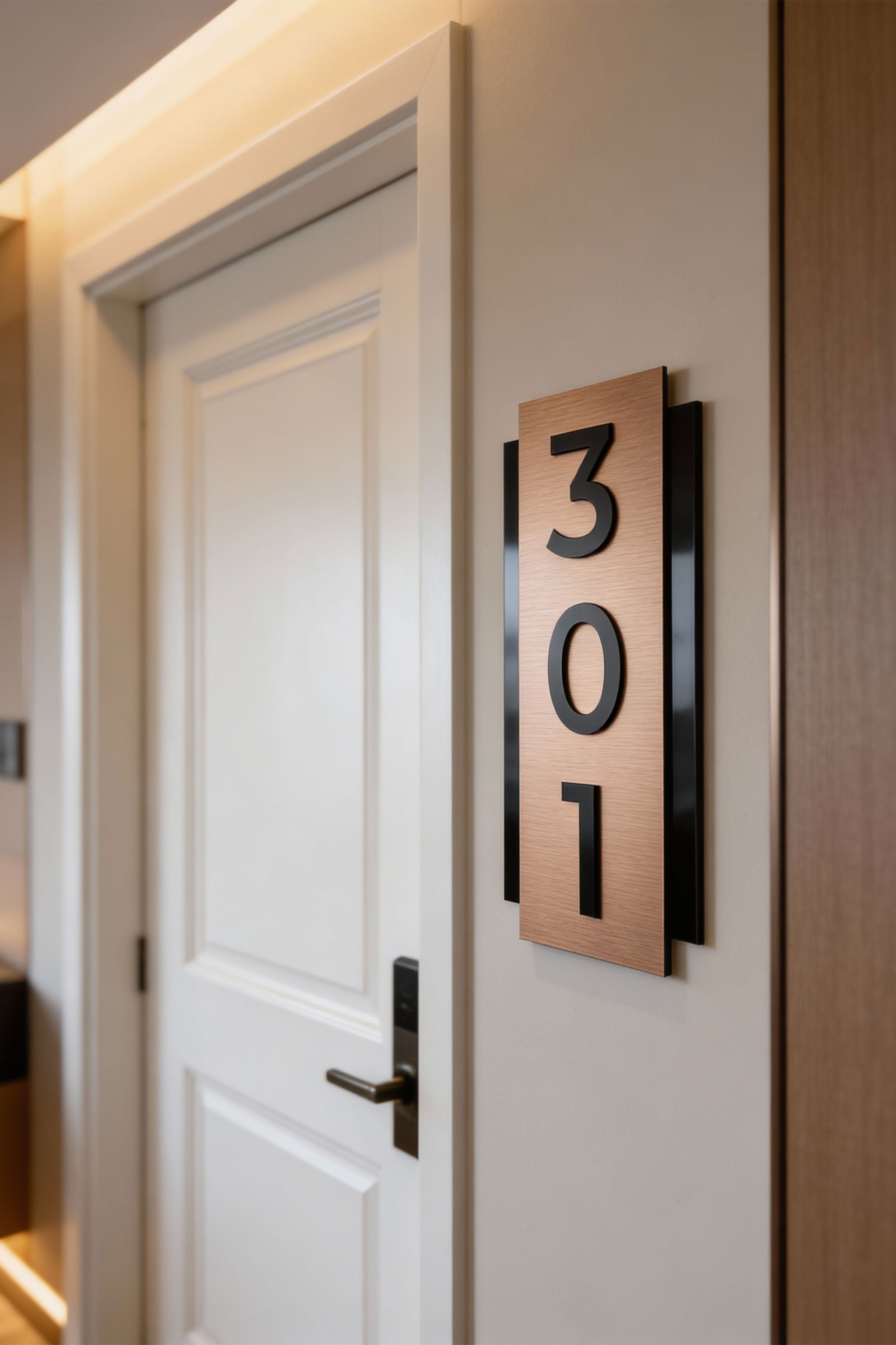 ALUMADESIGNCO vertical brushed bronze room number plaque with black acrylic glass characters, modern hotel door number signage for contemporary hotel corridors and apartments