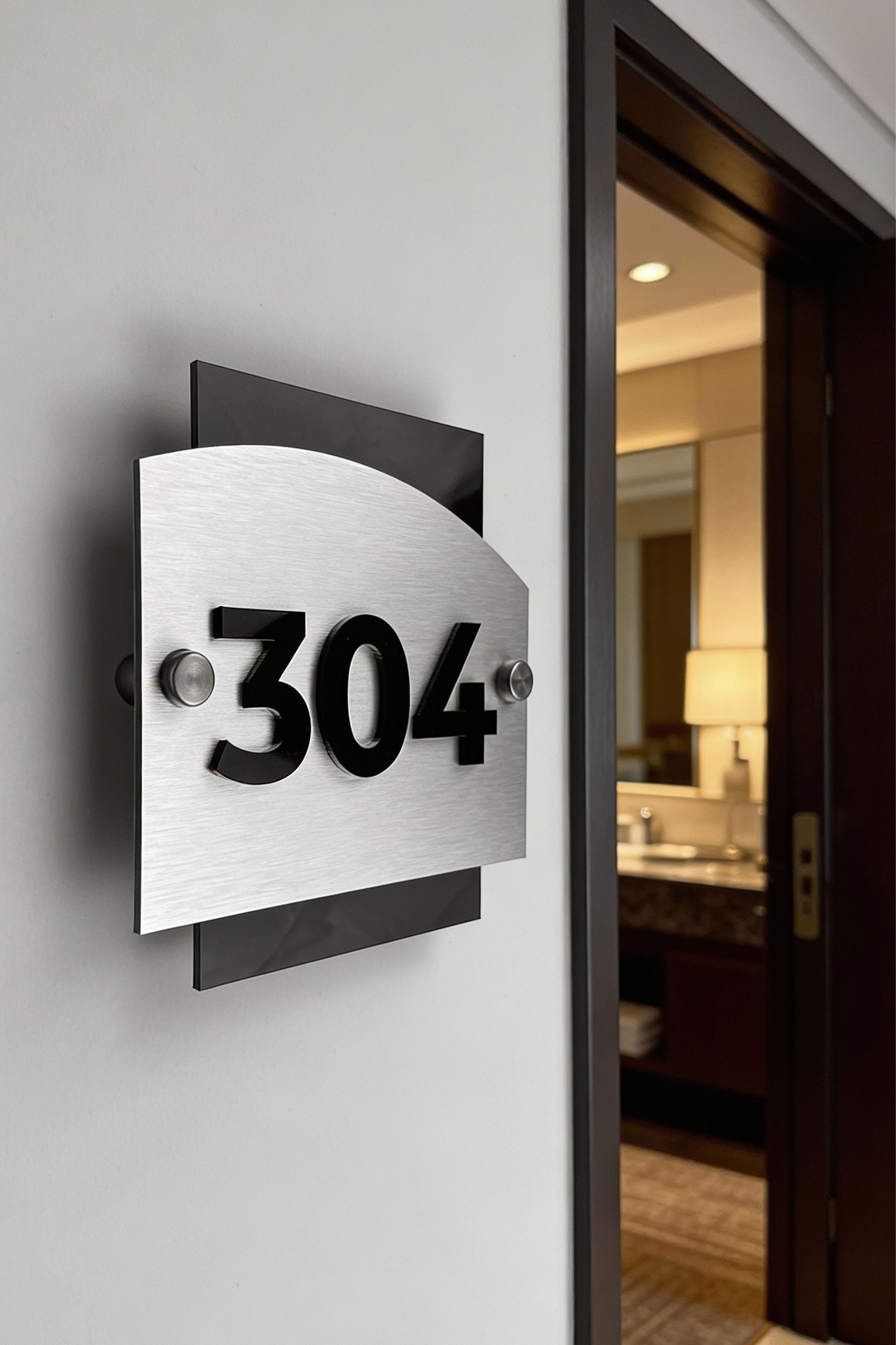 ALUMADESIGNCO Flow Design brushed silver hotel room number sign with raised 3D black acrylic numbers, modern door number plaque for boutique hotels and apartment interiors