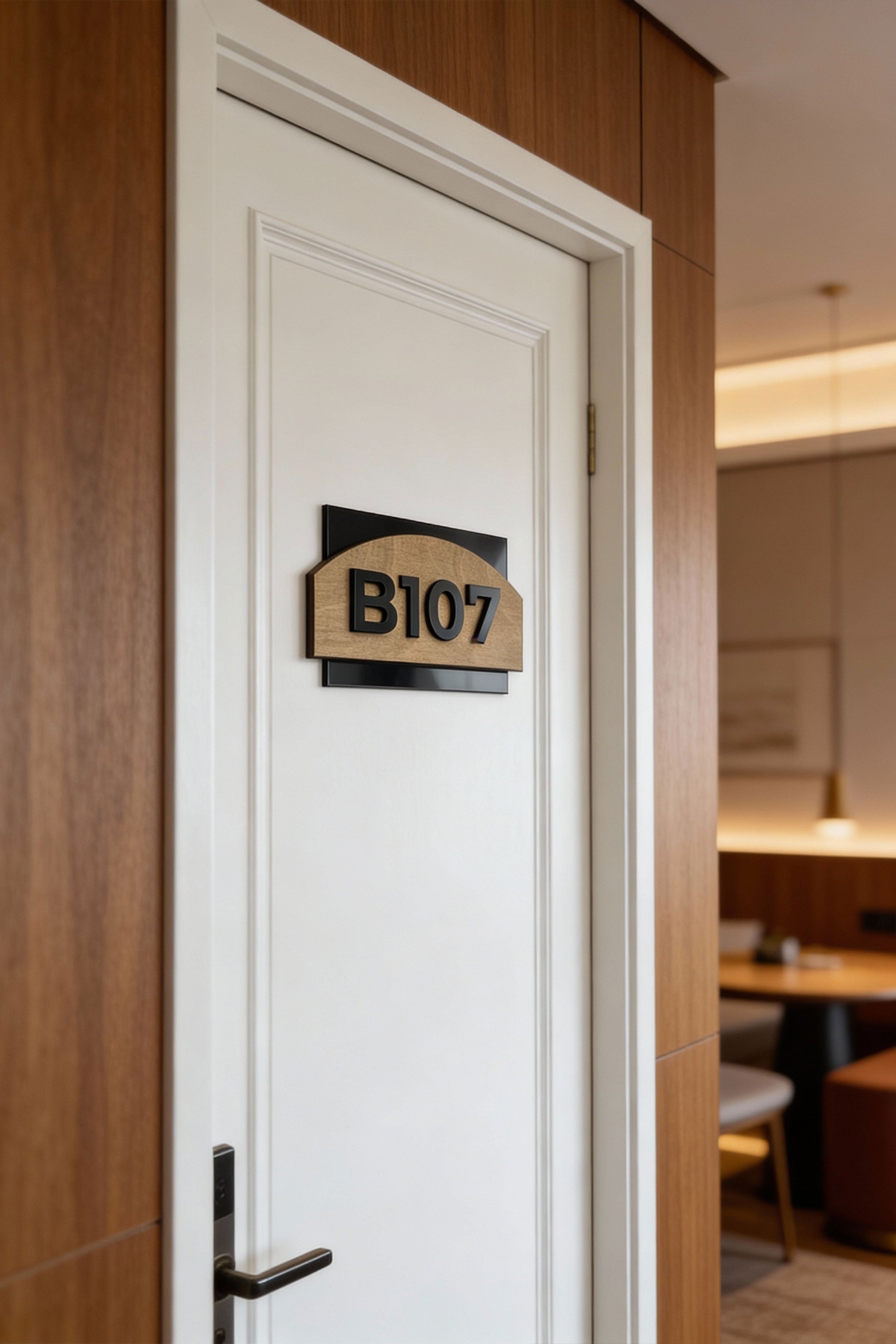 ALUMADESIGNCO custom hotel door number plaque combining natural wood and black acrylic numbers, modern Scandinavian signage for hotels and apartments