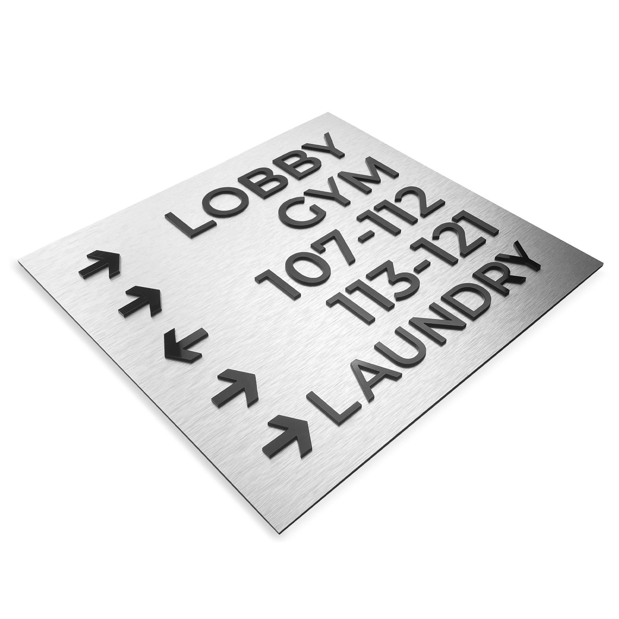 Vibrant, acrylic wayfinding sign for restrooms with male and female symbols, mounted on a wooden wall.
