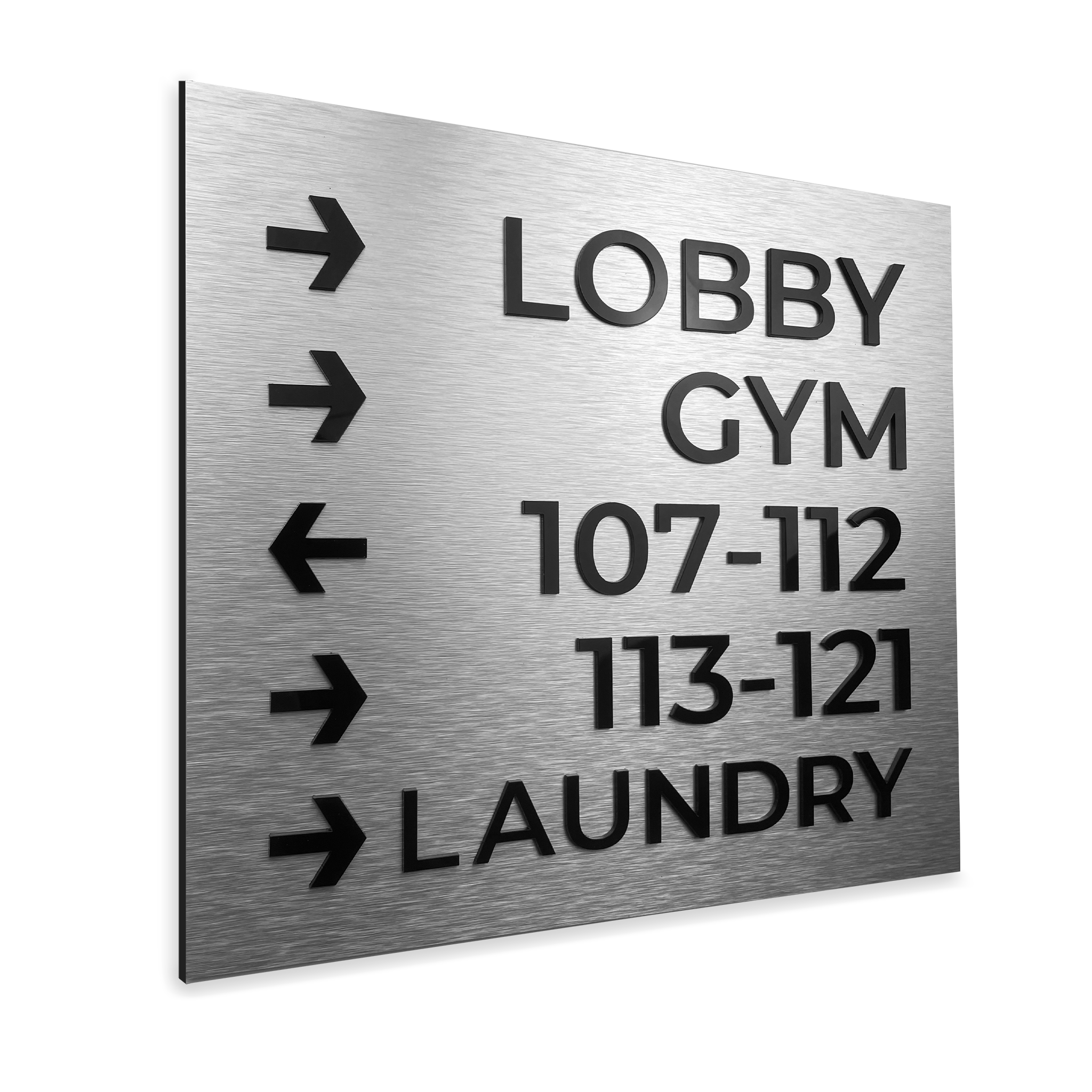 Modern, minimalist wayfinding sign for elevator access in a commercial building, featuring braille text