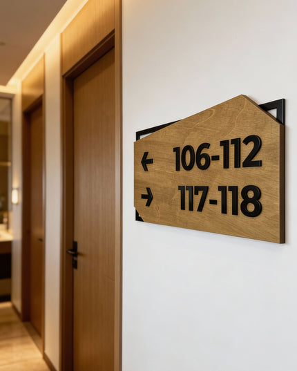 Personalized birch wood and black acrylic directional wall sign by ALUMADESIGNCO, elegant wayfinding plaque for offices, hotels, corridors, and modern interior spaces