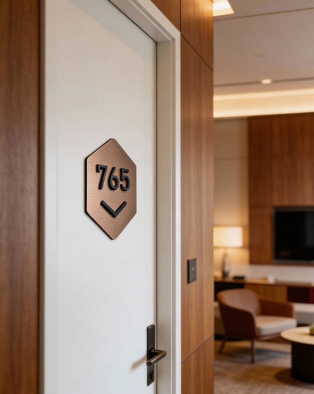ALUMADESIGNCO Hexagon Design brushed bronze room number sign with black acrylic numbers, modern geometric door signage for hotels, apartments, and offices