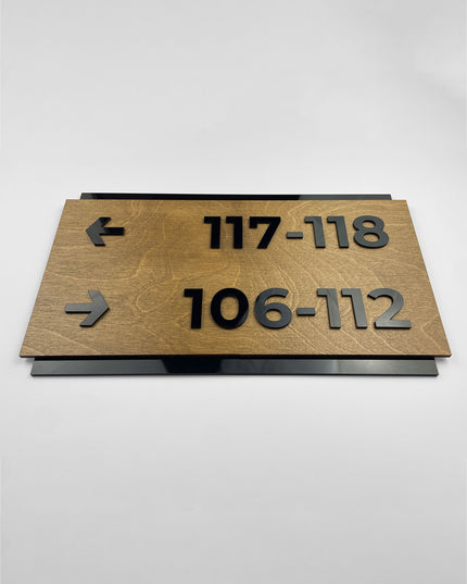 Birch wood directional wayfinding sign by ALUMADESIGNCO, elegant wall signage for offices, hotels, corridors, and modern interior spaces