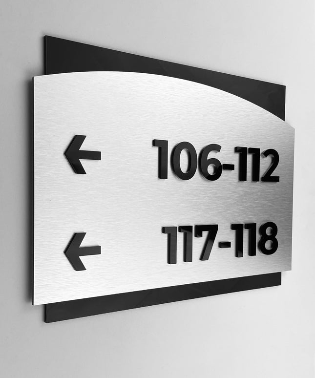 ALUMADESIGNCO directional wayfinding sign in Flow Design with sleek modern look, premium signage for offices, hotels, apartments, and interior spaces