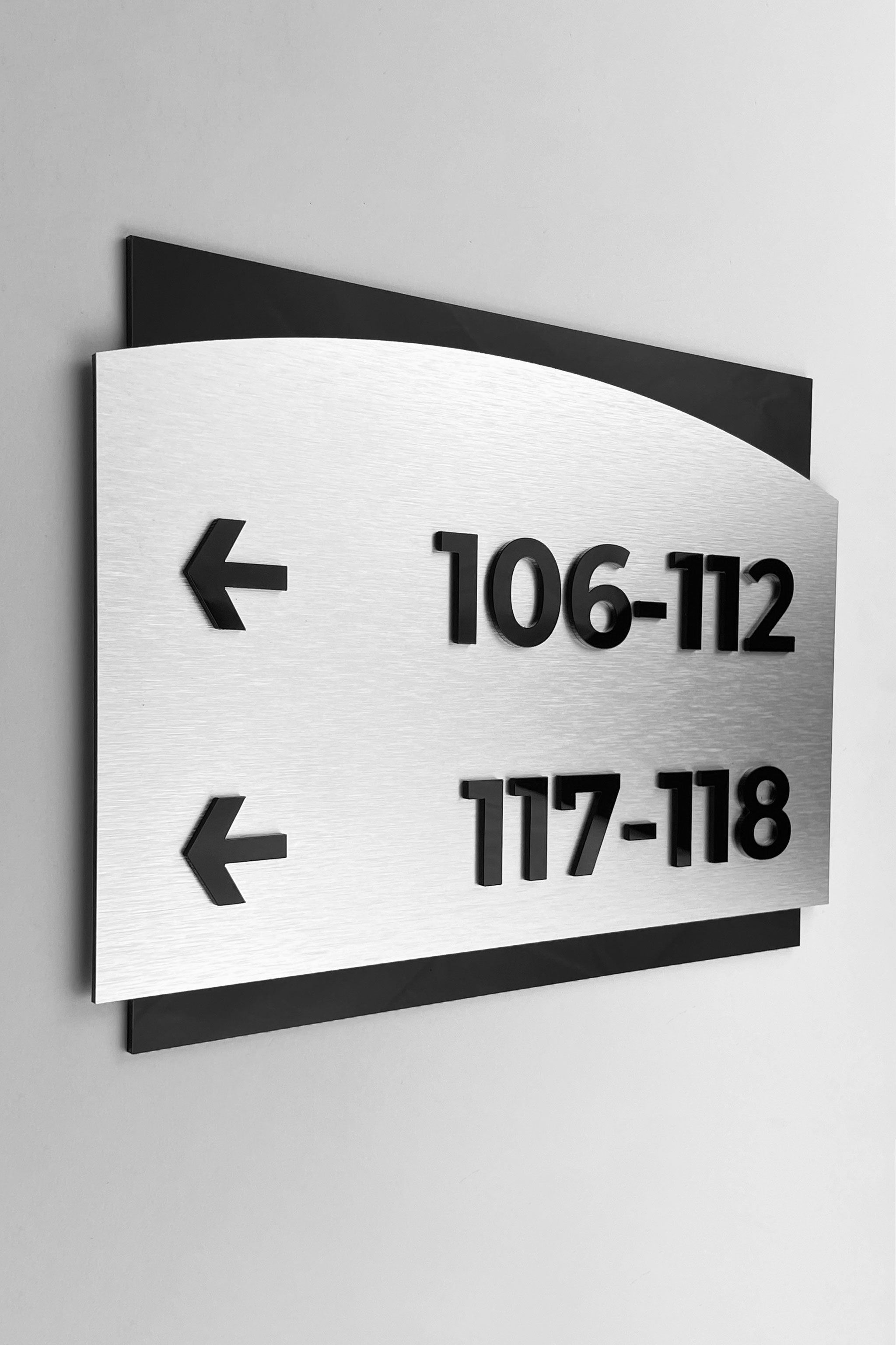 ALUMADESIGNCO directional wayfinding sign in Flow Design with sleek modern look, premium signage for offices, hotels, apartments, and interior spaces