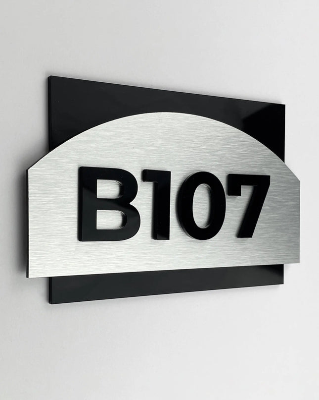 ALUMADESIGNCO Flow Design modern apartment door number sign with brushed silver plaque and black acrylic glass numbers, elegant signage for apartments and interiors