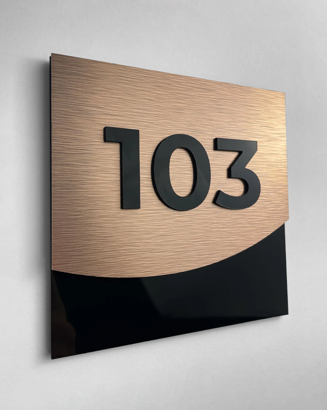 Contemporary bronze metal and acrylic glass suite number sign by ALUMADESIGNCO, elegant door plaque for hotel suites and apartment interiors