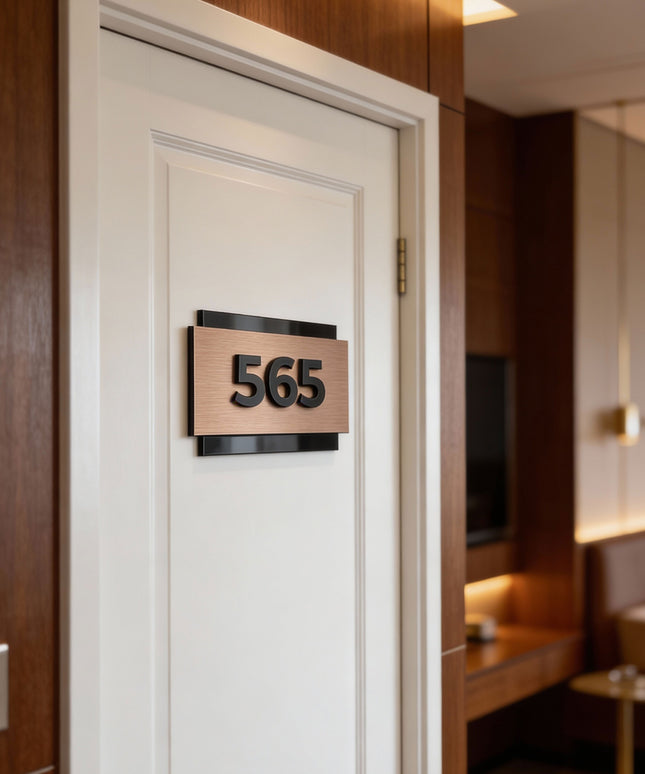 ALUMADESIGNCO hotel room number sign with brushed bronze finish and raised 3D acrylic characters, modern door signage for boutique hotels, apartments, and interiors