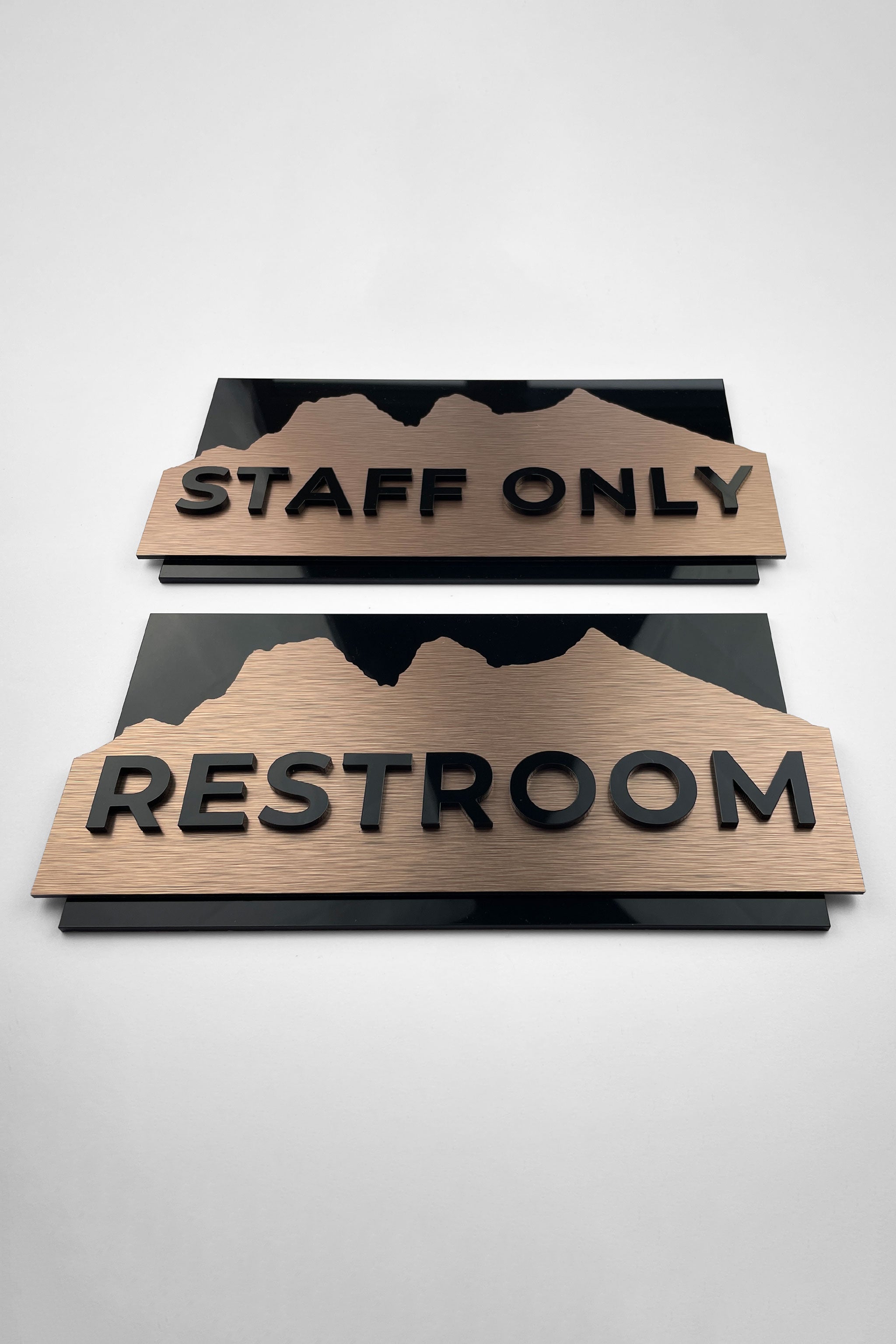Custom brushed bronze and 3D black acrylic door sign by ALUMADESIGNCO, premium door plaque for hotel rooms, offices, and contemporary interiors