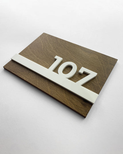 Wooden room number sign Horizon Design by ALUMADESIGNCO featuring natural birch wood base and raised glossy white acrylic numbers for modern hotel rooms and apartment doors