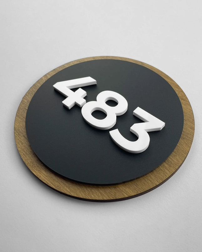 Round Design room number sign by ALUMADESIGNCO crafted from birch wood and black acrylic numbers, modern wood and acrylic door plaque for hotels, apartments, and contemporary interiors