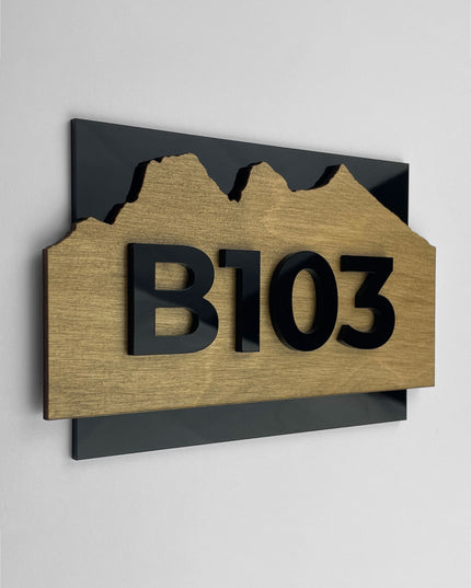 Hotel room number sign Alpine Design by ALUMADESIGNCO featuring birch plywood base and acrylic glass numbers, modern Scandinavian door plaque for hotel corridors and Airbnb interiors