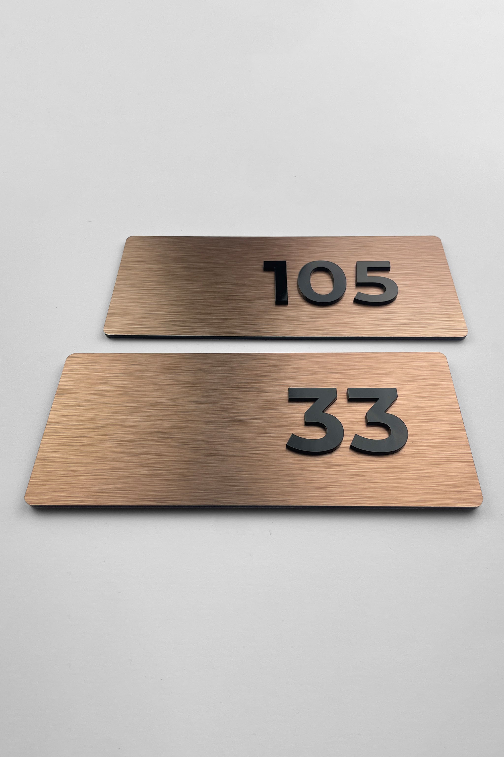 ALUMADESIGNCO brushed bronze Classic apartment number sign with minimalist modern design, premium signage for apartments, Airbnb properties, and office spaces