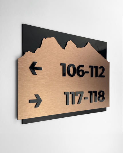 Brushed bronze and acrylic directional way sign Alpine Design by ALUMADESIGNCO, elegant wall signage for offices, hotels, corridors, and modern interior spaces