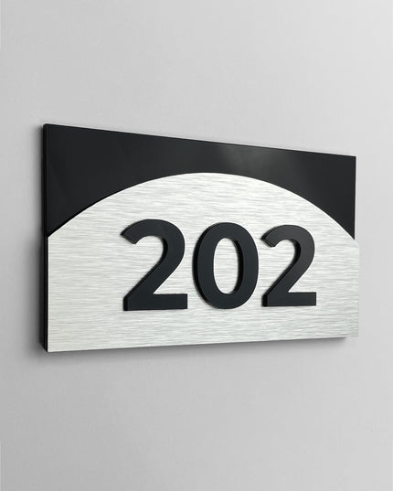 ALUMADESIGNCO Flow apartment number sign with brushed silver metal panel and raised acrylic 3D numbers, premium signage for residential and office spaces