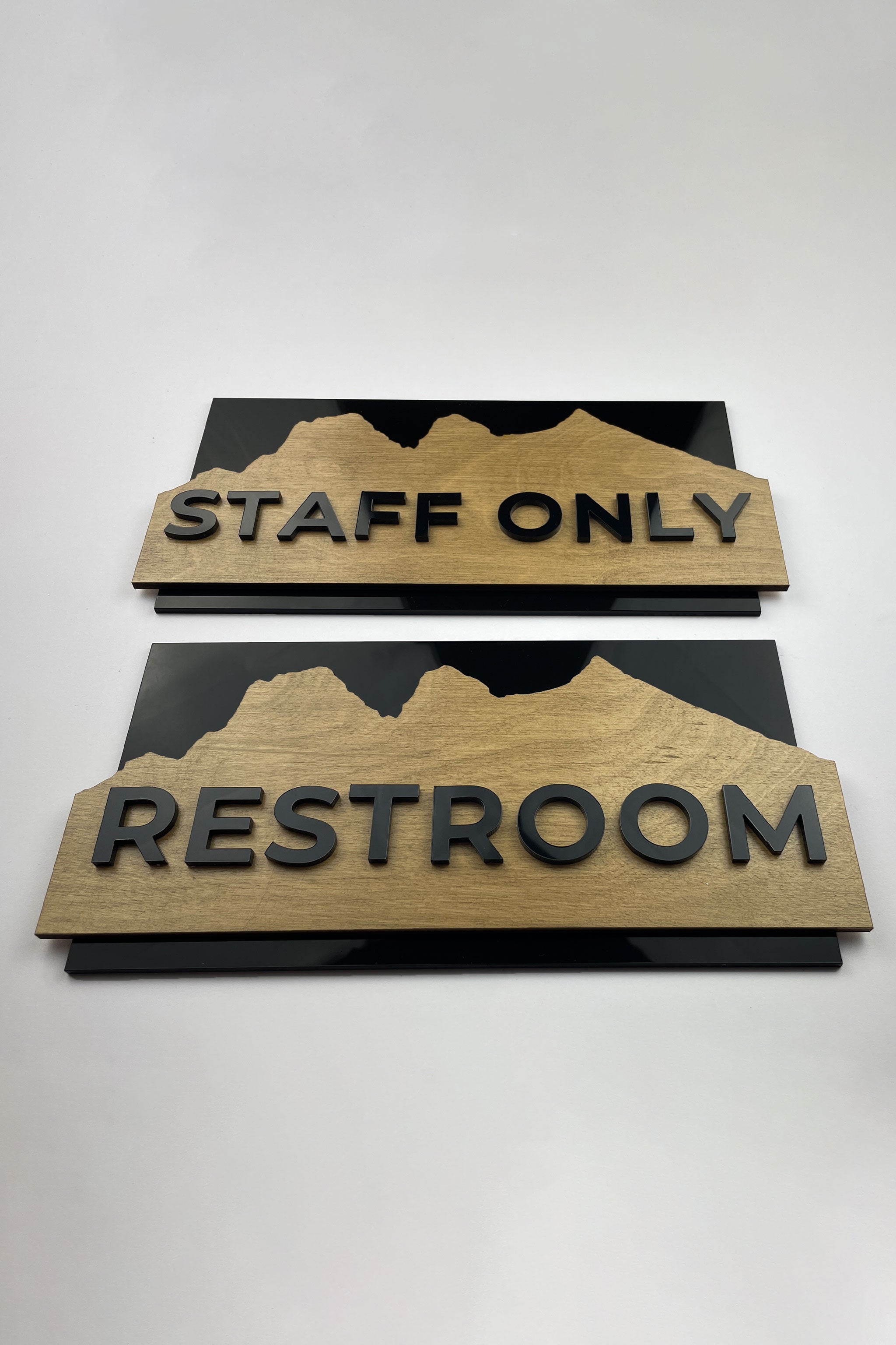 Custom birch wood and acrylic glass door sign Alpine Design by ALUMADESIGNCO featuring natural wood base and acrylic text, elegant signage for interiors