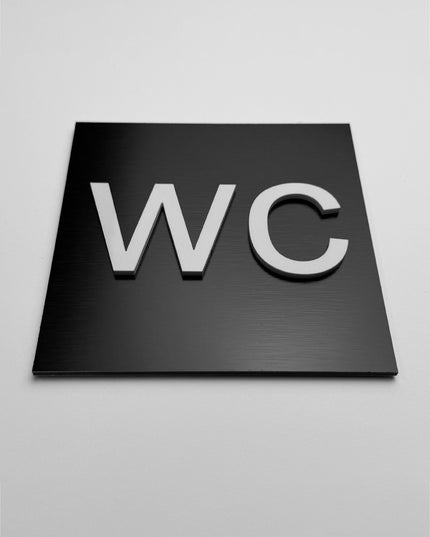 ALUMADESIGNCO WC toilet door sign with minimalist design, stylish bathroom signage for offices, hospitality spaces, and commercial buildings