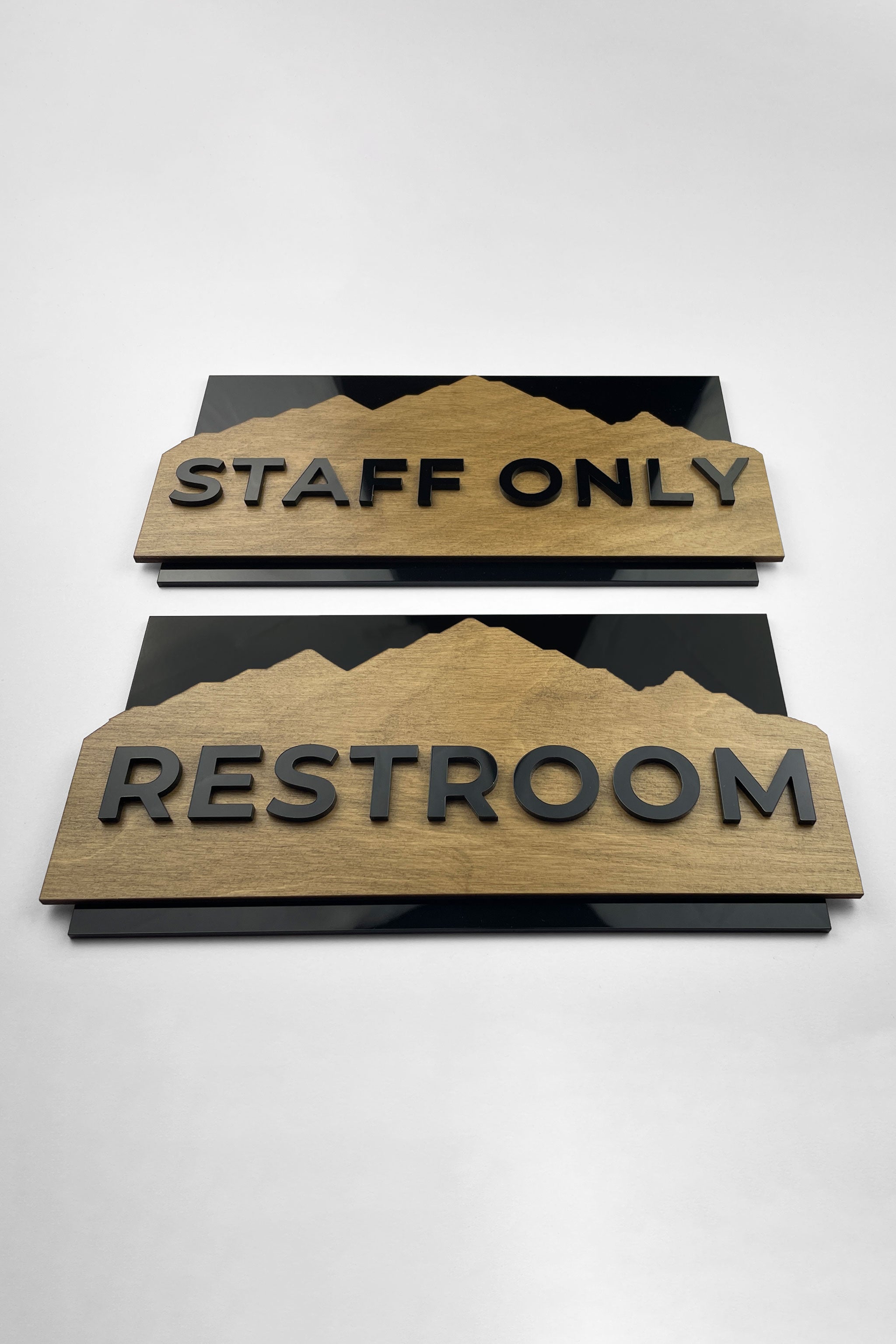Modern Alpine Design wall door sign by ALUMADESIGNCO combining natural birch wood plate and black acrylic lettering, stylish signage for interior spaces