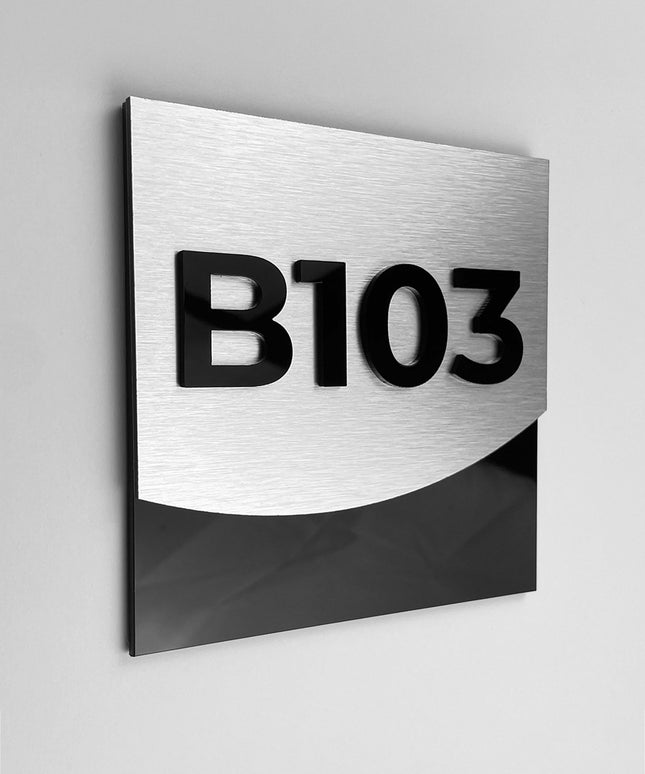 Luxury brushed silver hotel room number sign by ALUMADESIGNCO featuring metal plaque and acrylic numbers, elegant door signage for hotel corridors and apartment interiors