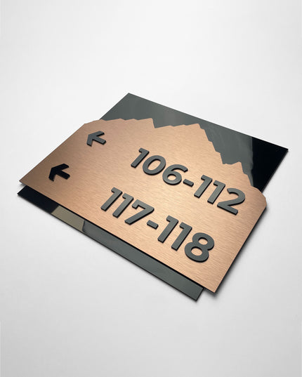 Brushed bronze and black acrylic directional sign Alpine Design by ALUMADESIGNCO, elegant wayfinding plaque for hotels, offices, corridors, and contemporary interior spaces