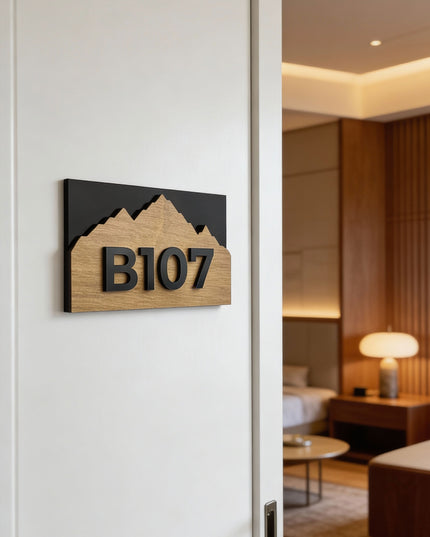 Custom Alpine apartment door number sign by ALUMADESIGNCO featuring natural wood base and acrylic numbers, modern door plaque for apartments and contemporary interiors