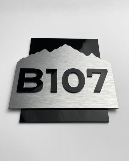 Modern Alpine Design 3D layered room number plaque by ALUMADESIGNCO combining layered materials and acrylic numbers, stylish door signage for hotels and apartments
