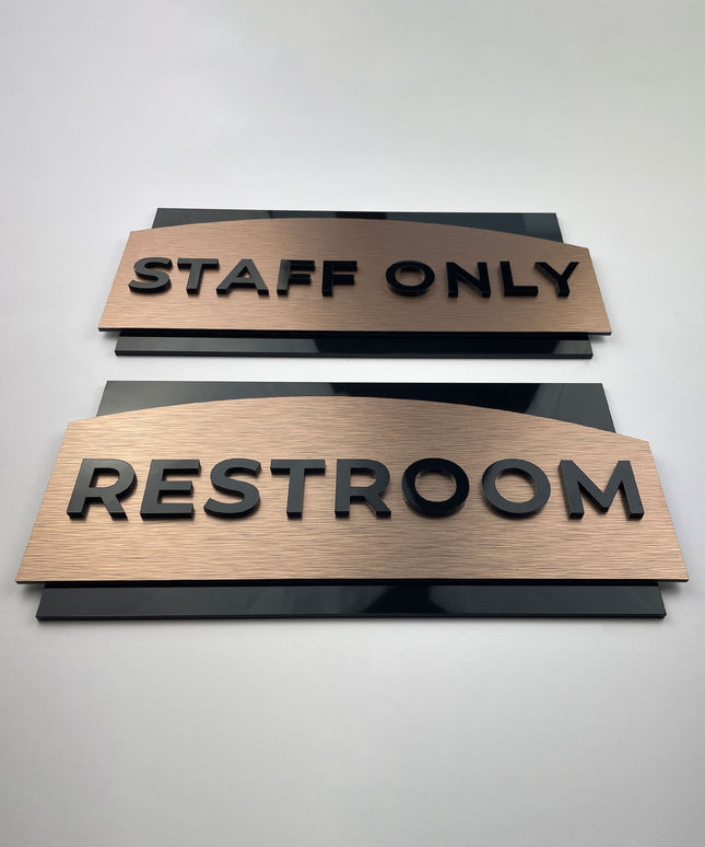 Custom brushed bronze and black acrylic office door sign by ALUMADESIGNCO, elegant door plaque for offices, meeting rooms, and contemporary interiors