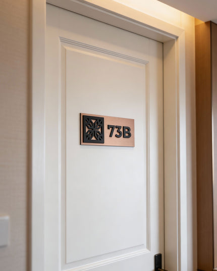 Modern Mosaic Design hotel room number sign by ALUMADESIGNCO combining brushed bronze metal panel and acrylic numbers, stylish door signage for contemporary interiors