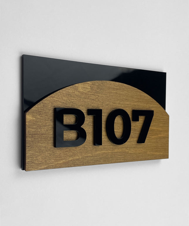 Birch plywood room number sign Flow Design by ALUMADESIGNCO featuring natural wood base and acrylic glass numbers for modern hotel rooms and apartment doors