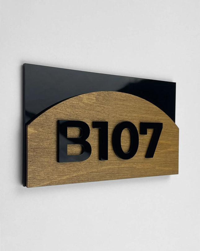 Birch plywood room number sign Flow Design by ALUMADESIGNCO featuring natural wood base and acrylic glass numbers for modern hotel rooms and apartment doors