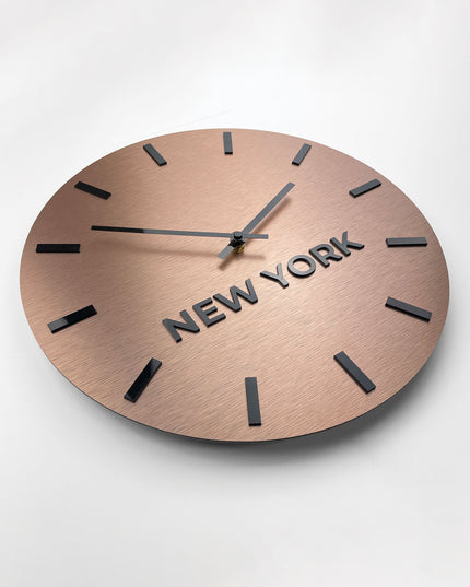 Brushed bronze world time zone wall clock by ALUMADESIGNCO featuring multiple city name plaques, elegant wall clock for offices, reception areas, and modern spaces