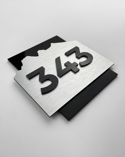 ALUMADESIGNCO brushed silver and acrylic hotel room number sign Alpine Design with minimalist modern style, premium door number signage for hotels, offices, and apartments