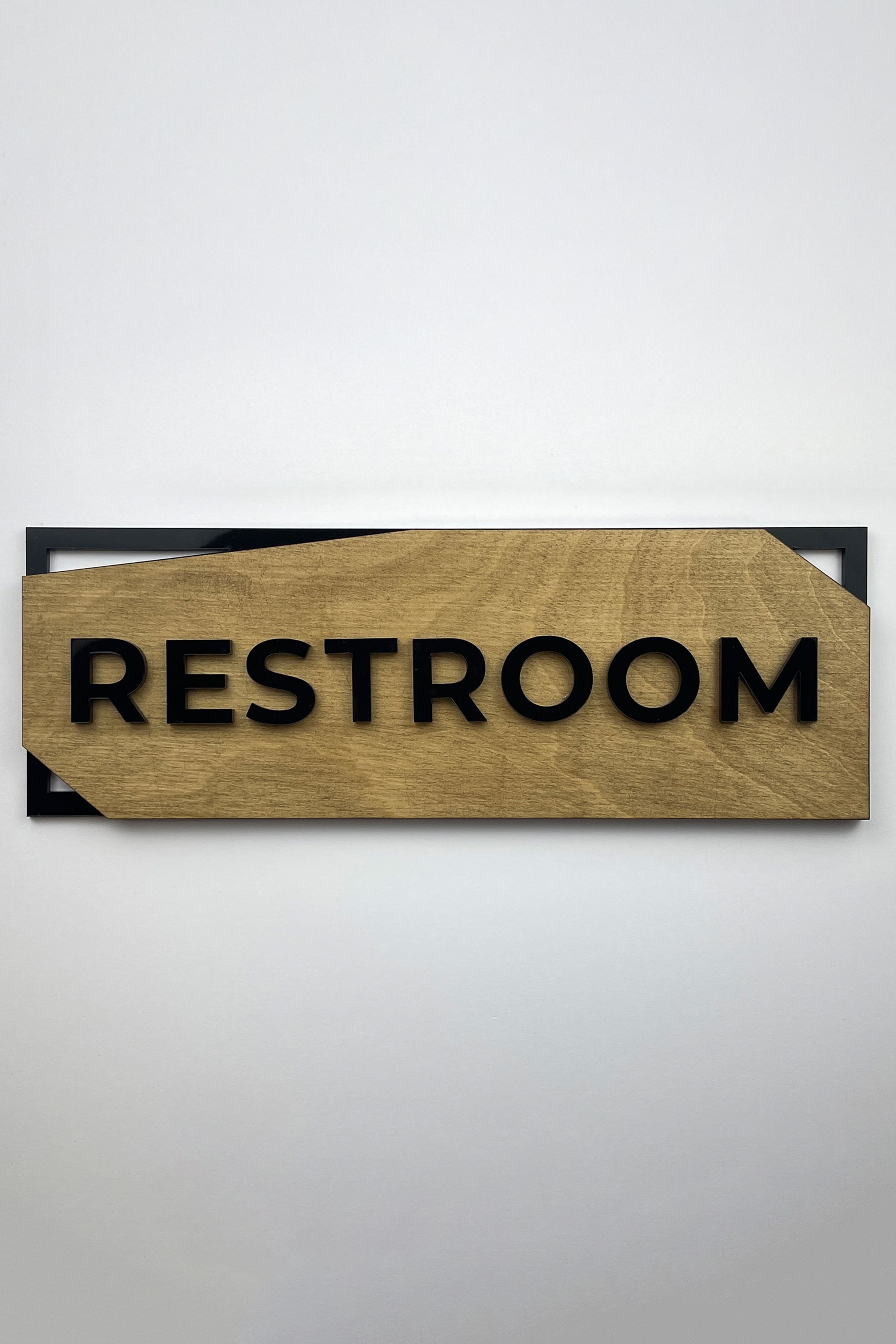 Modern minimalist door sign by ALUMADESIGNCO combining natural birch wood and black acrylic lettering, stylish room plaque for interiors