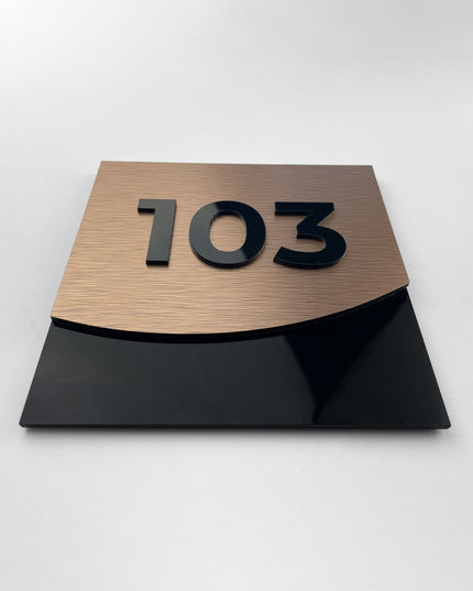 ALUMADESIGNCO bronze apartment door number plaque with 3D layered acrylic numbers, modern signage for apartments, offices, and hospitality interiors