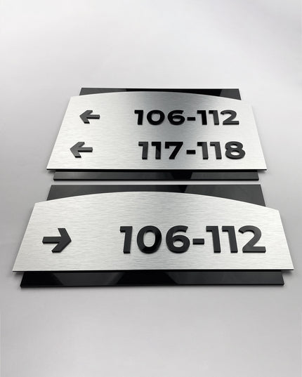 Premium Flow directional wall sign by ALUMADESIGNCO, modern wayfinding signage for offices, hotels, apartment buildings, and commercial interiors