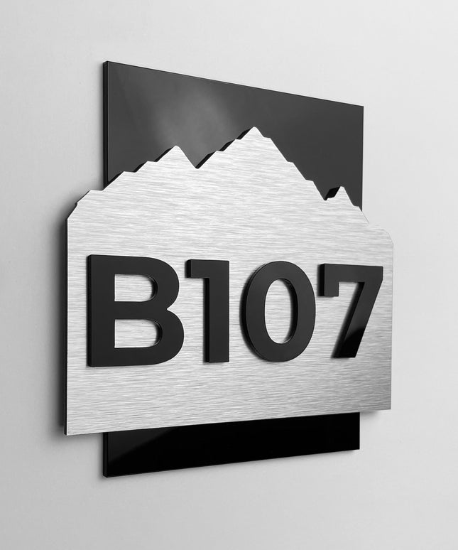3D layered hotel room number sign Alpine Design by ALUMADESIGNCO featuring wood and acrylic layers, modern door plaque for hotel corridors and apartment interiors
