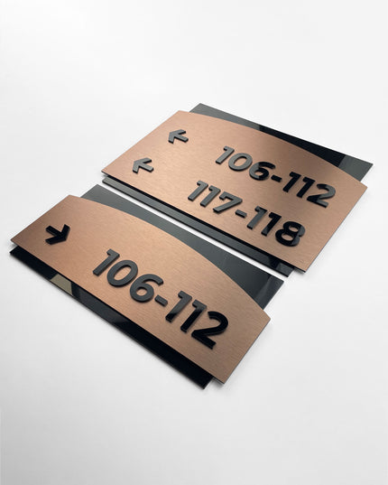 ALUMADESIGNCO Flow brushed bronze directional wall sign with acrylic lettering, stylish signage for offices, hotels, Airbnb properties, and public interiors