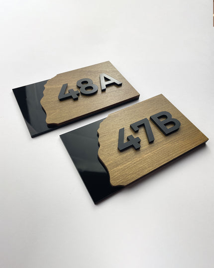 Custom Fusion apartment door number sign by ALUMADESIGNCO featuring wood base and acrylic numbers, modern door plaque for apartments and contemporary interiors