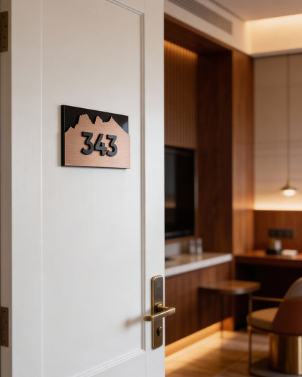 High-end brushed bronze and acrylic room number sign Alpine Design by ALUMADESIGNCO, premium door plaque for boutique hotels and apartment interiors