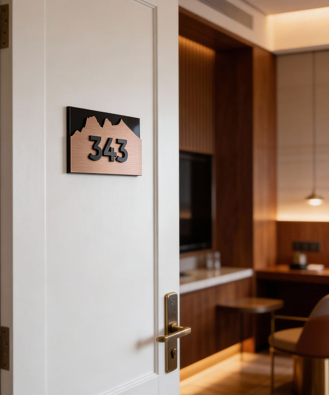 High-end brushed bronze and acrylic room number sign Alpine Design by ALUMADESIGNCO, premium door plaque for boutique hotels and apartment interiors