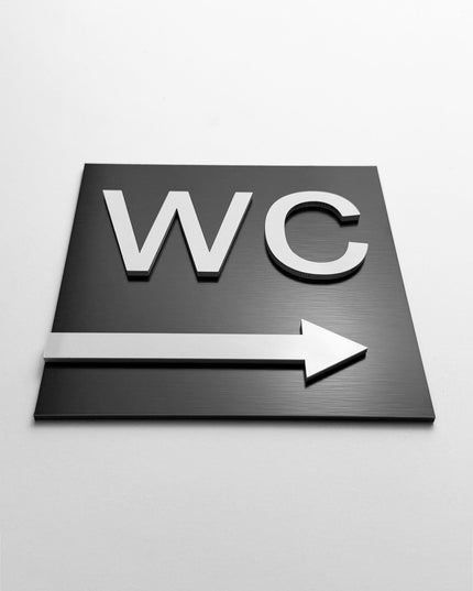 WC arrow right sign by ALUMADESIGNCO, stylish toilet direction plaque for hotels, offices, restaurants, and public interior spaces