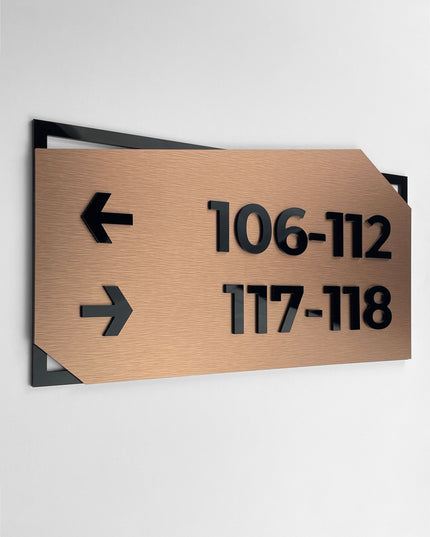 Premium directional wall sign by ALUMADESIGNCO featuring brushed bronze plaque and black acrylic lettering, modern signage for hospitality, office, and residential interiors