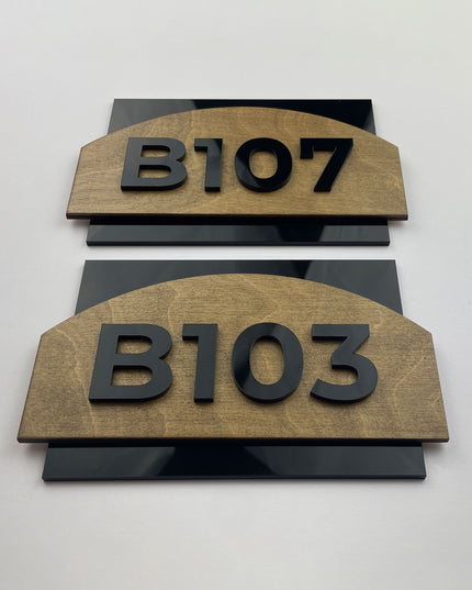 Custom wood door number sign by ALUMADESIGNCO featuring birch wood base and black acrylic numbers, modern hotel room signage for apartments and office doors